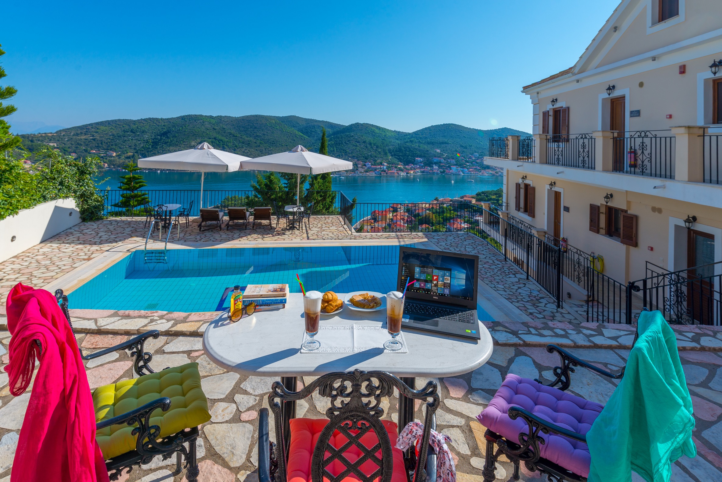 Pool area of apartment complex for sale in Ithaca Greece Vathi