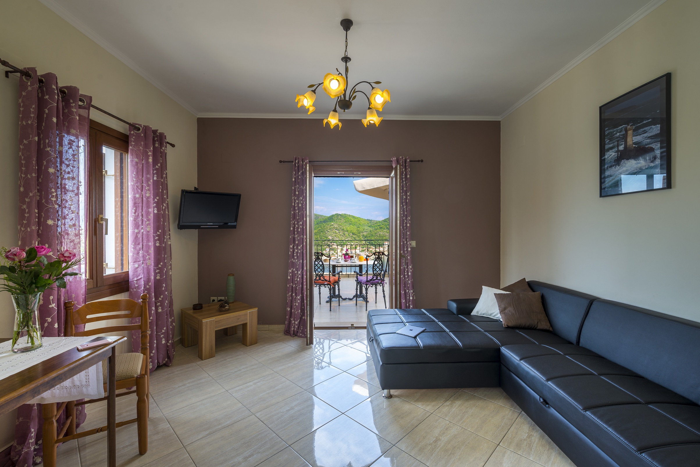 Living area and balcony of apartment complex for sale in Ithaca Greece Vathi