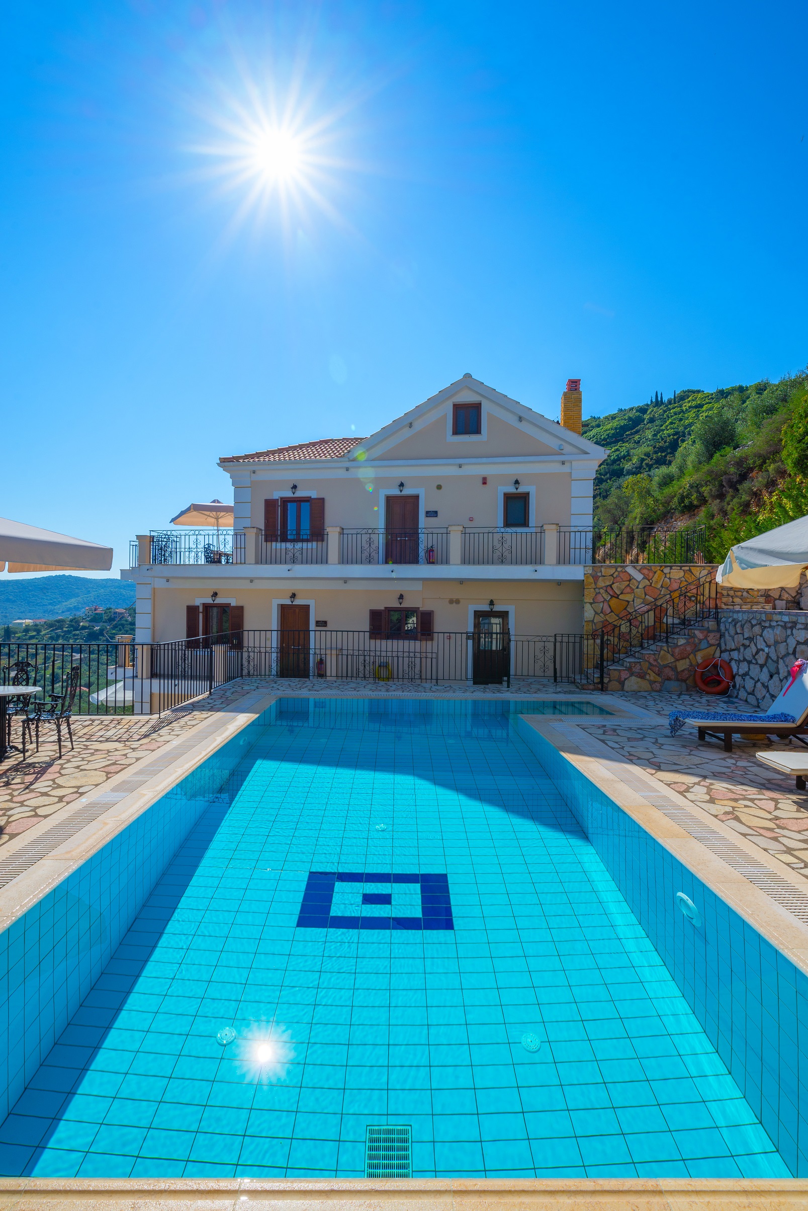 Pool area of apartment complex for sale in Ithaca Greece Vathi