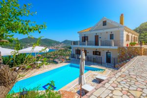 Pool and outside space of apartment complex for sale in Ithaca Greece Vathi