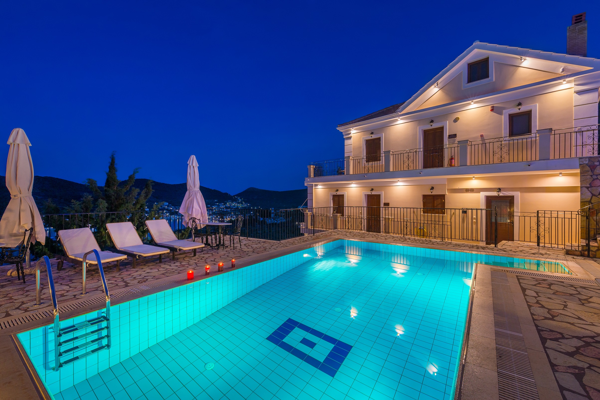 Swimming pool of apartment complex for sale in Ithaca Greece Vathi