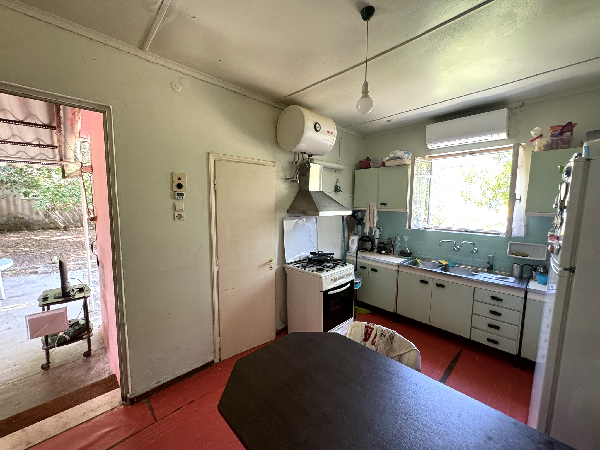 Kitchen area of house for sale in Ithaca Greece Vathi