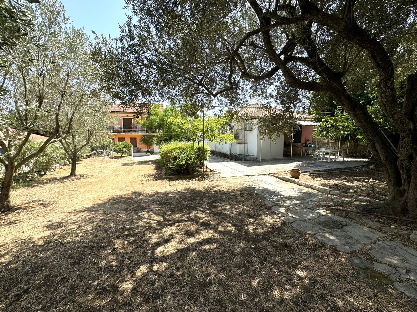 Garden and exterior of house for sale in Ithaca Greece Vathi