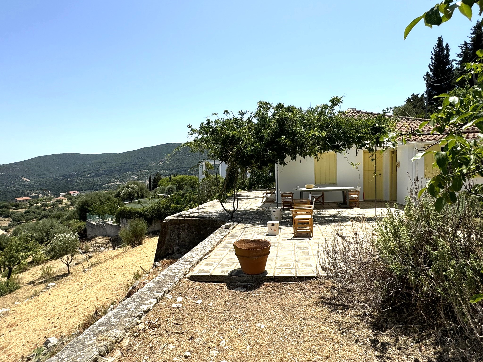 Patio and exterior of house for sale in Ithaca Greece Platrithya