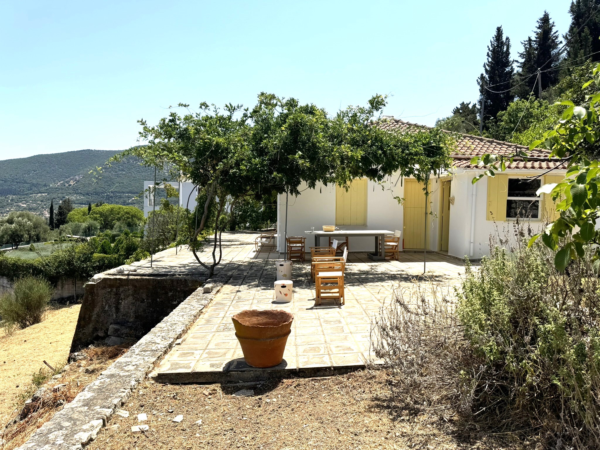 Patio and exterior of house for sale in Ithaca Greece Platrithya