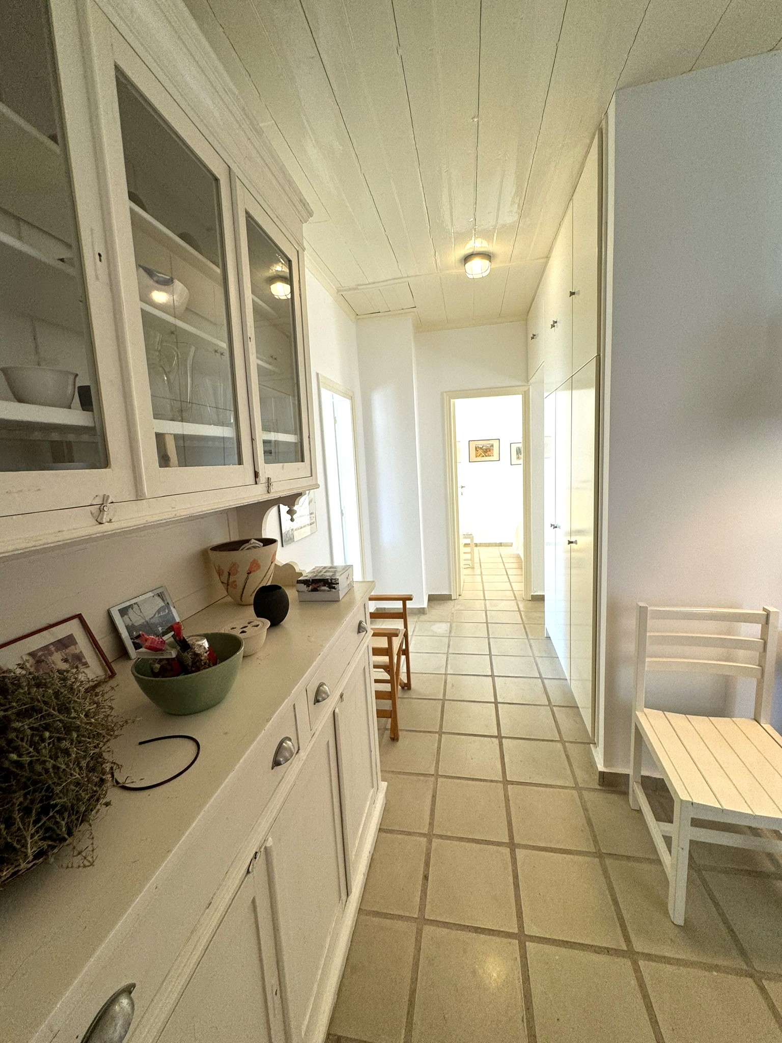 Kitchen area and passageway of house for sale in Ithaca Greece Platrithya