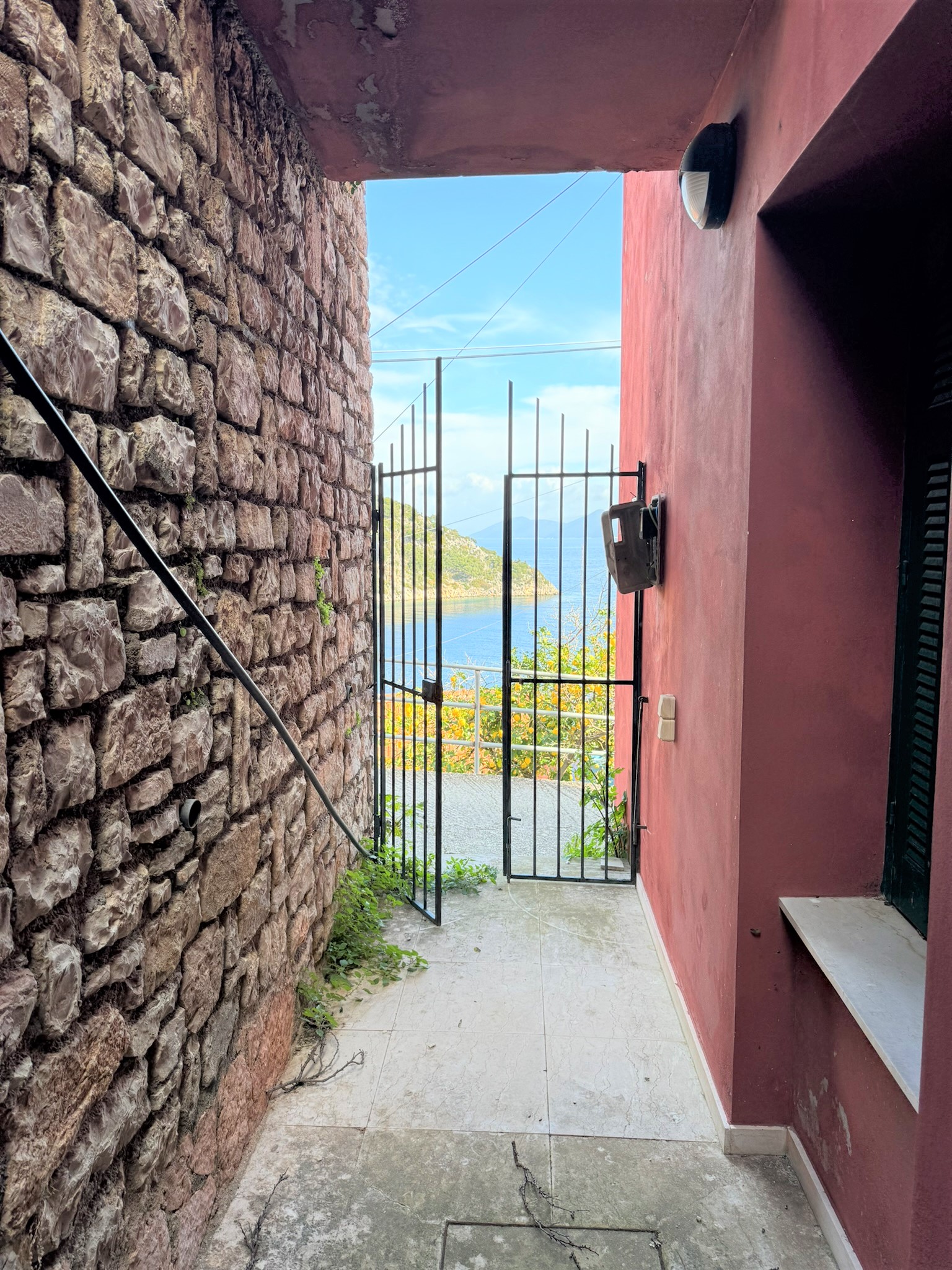 Front gate of house for sale in Ithaca Greece Kioni