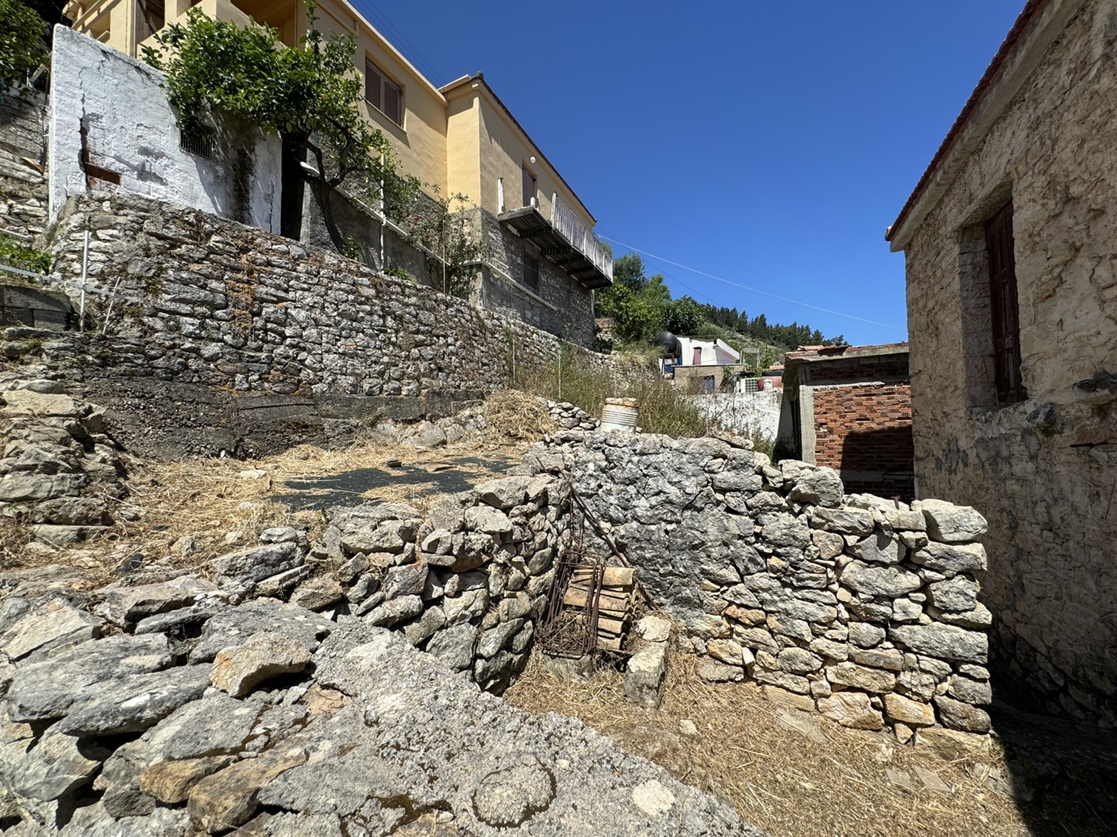 Back terrain of house for sale in Ithaca Greece Vathi