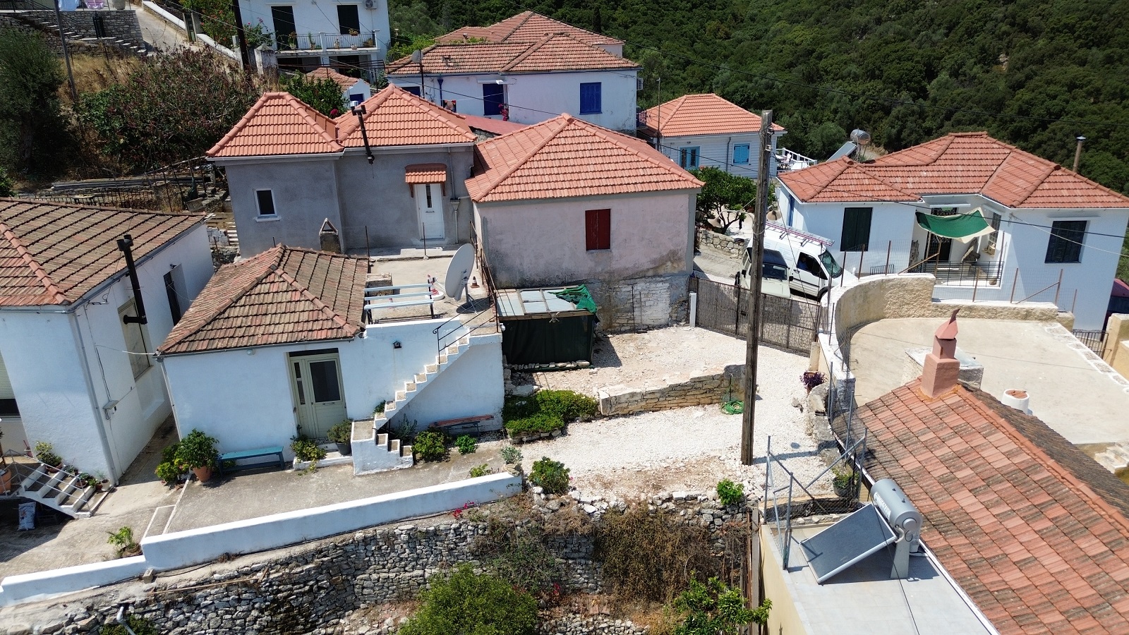 Aerial view of land with building license for sale in Ithaca Greece Kioni