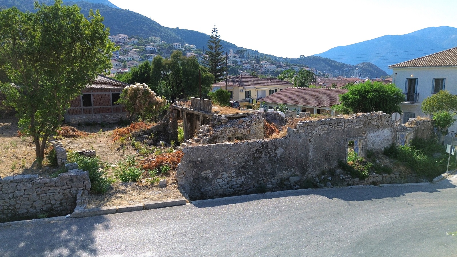 Road view of land for sale in Ithaca Greece Vathi