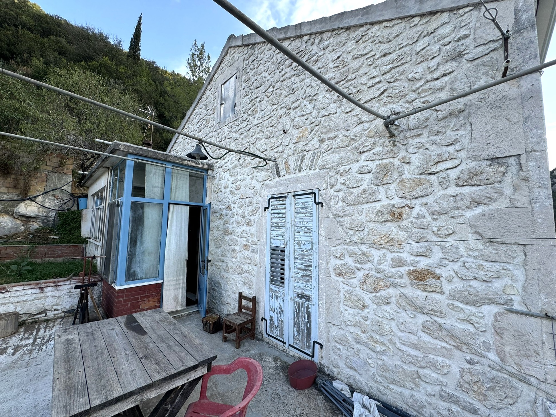 Exterior of house for sale in Ithaca Greece Frikes