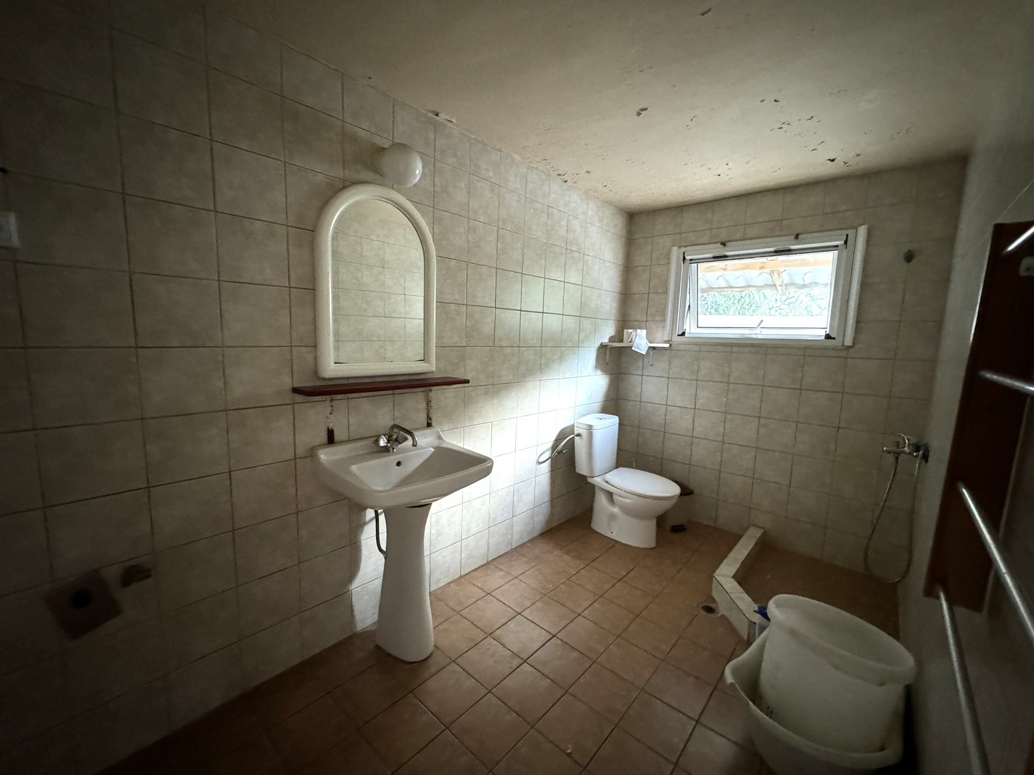 Bathroom of house for sale in Ithaca Greece Frikes