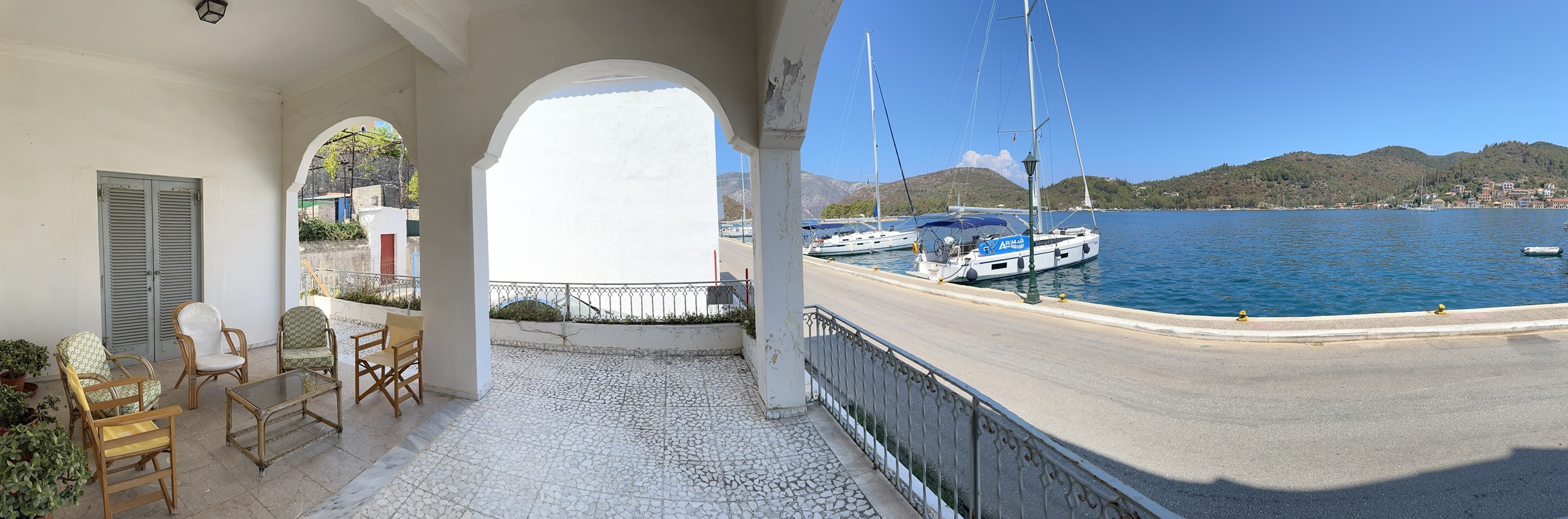 Panoramic view of the covered veranda of house for sale in Ithaca Greece Vathi