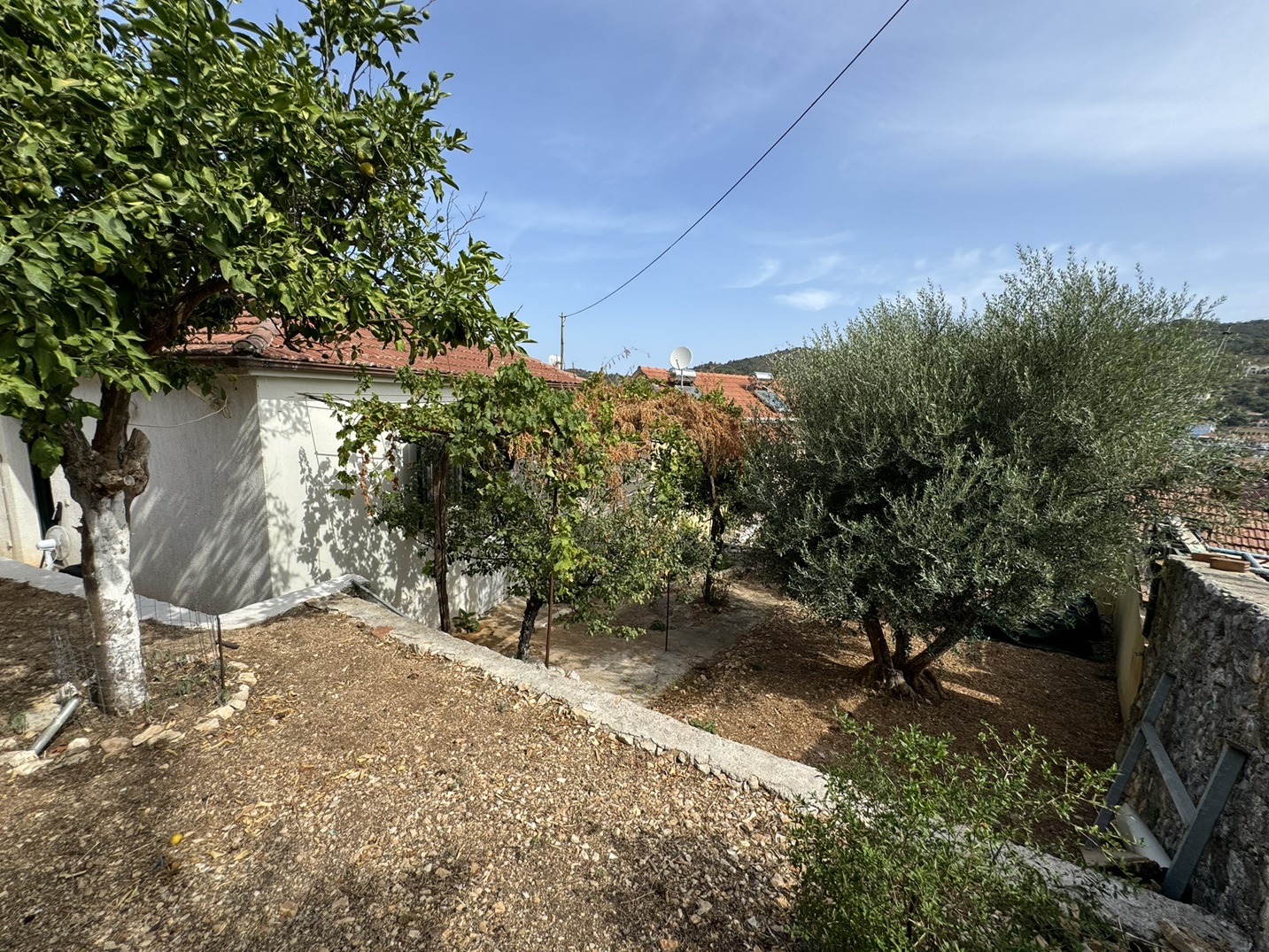 Outdoor areas and garden of house for sale in Ithaca Greece Vathi