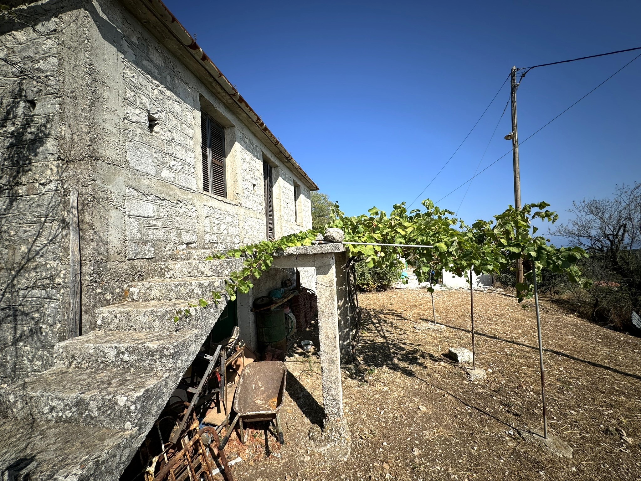 Exterior of house for sale in Ithaca Greece Anoghi