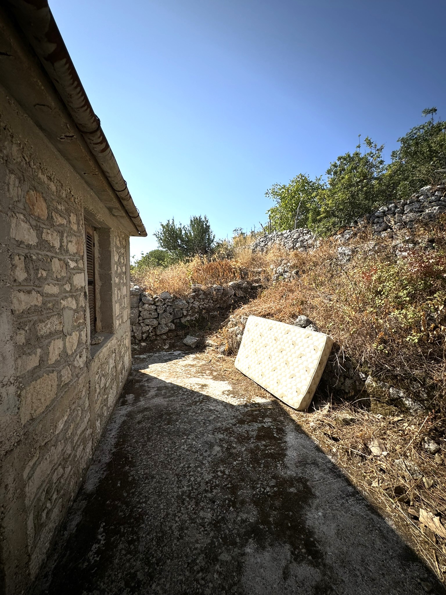 Exterior of house for sale in Ithaca Greece Anoghi