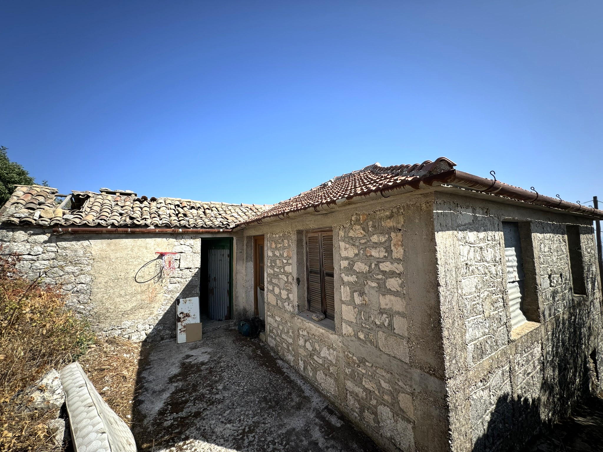 Exterior of house for sale in Ithaca Greece Anoghi