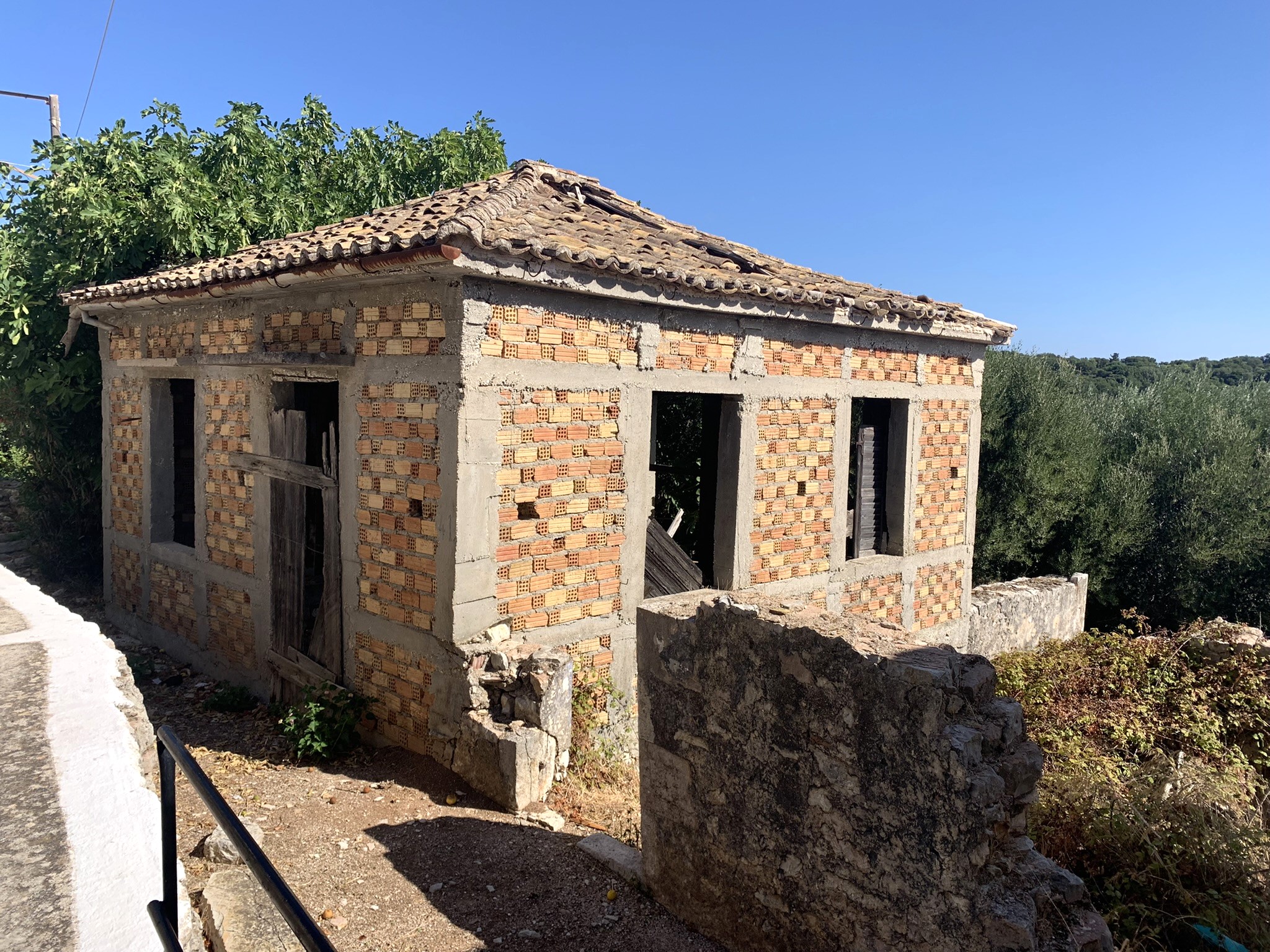 Exterior of house for sale in Ithaca Greece Kioni