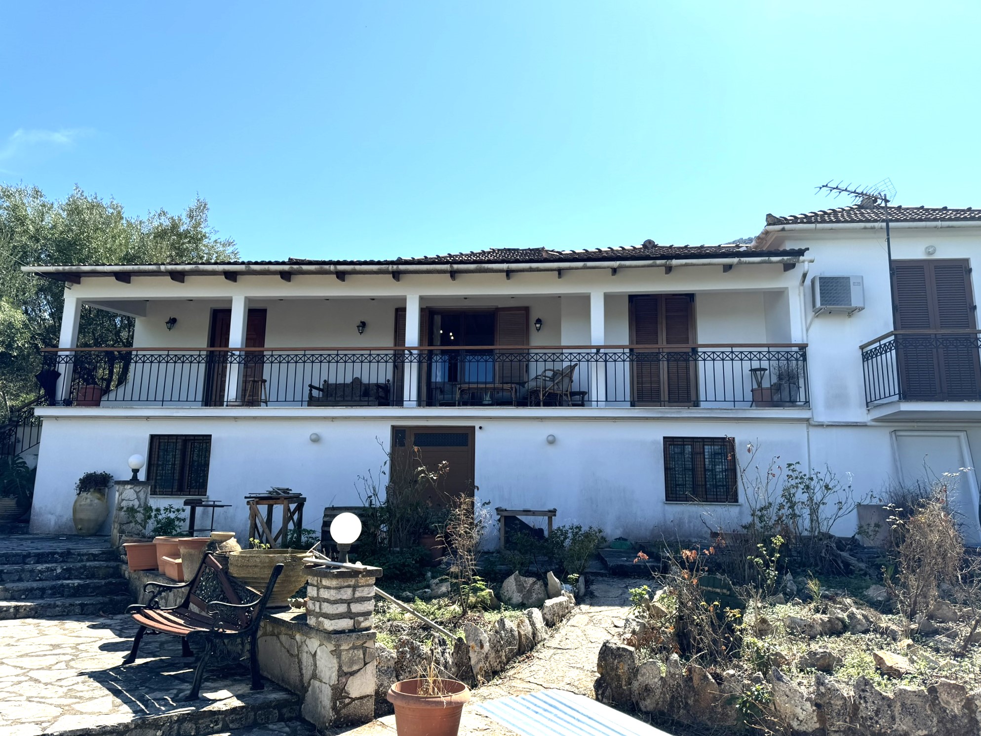 Exterior of house for sale in Ithaca Greece Stavros