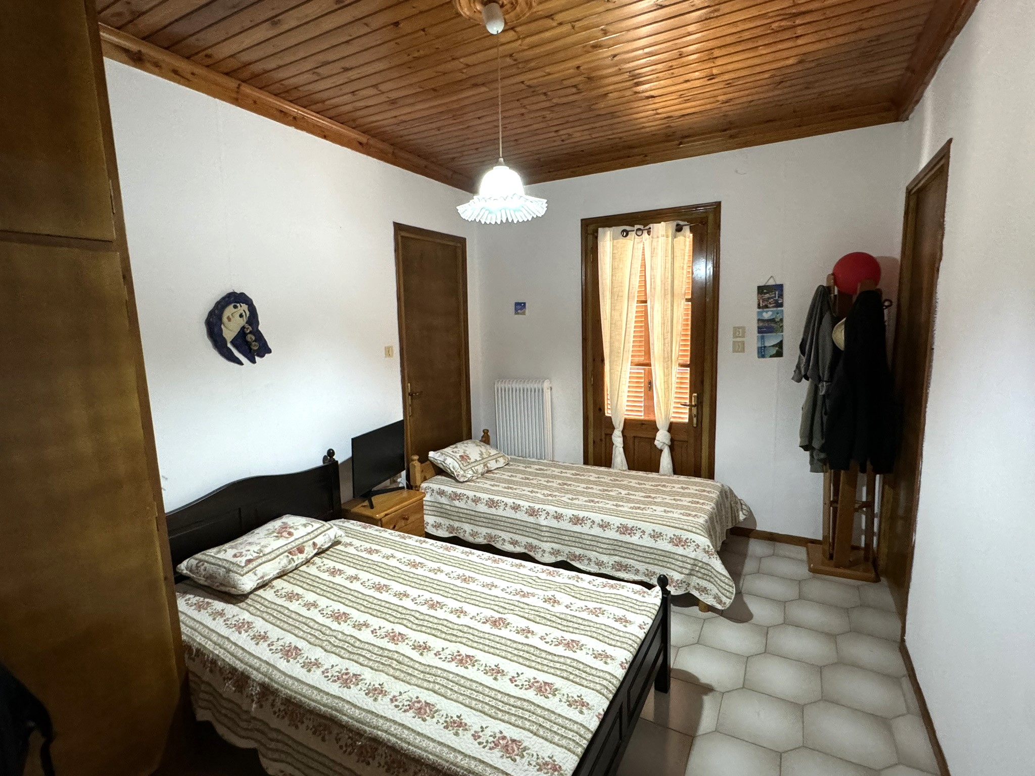 Twin bedroom of house for sale in Ithaca Greece Stavros