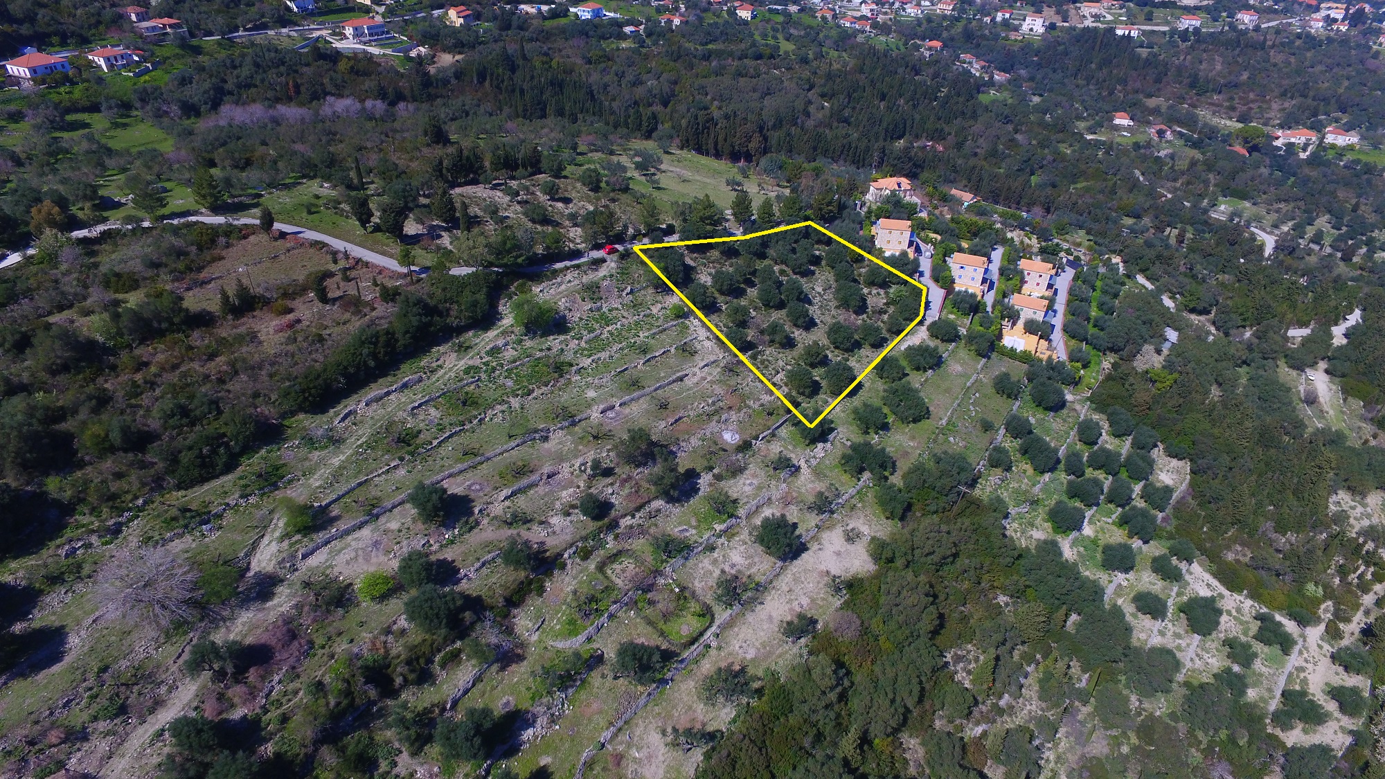 Aerial view and border of land with building license for sale in Ithaca Greece Pilikata