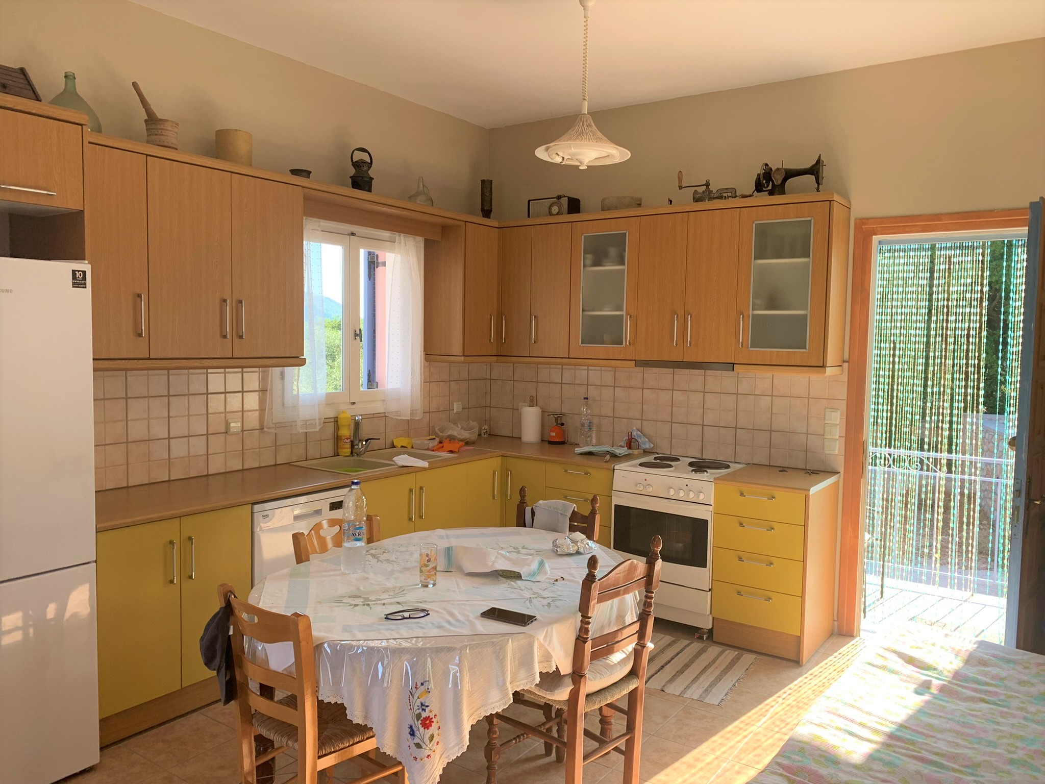 Kitchen and dining area of house for sale in Ithaca Greece, Stavros