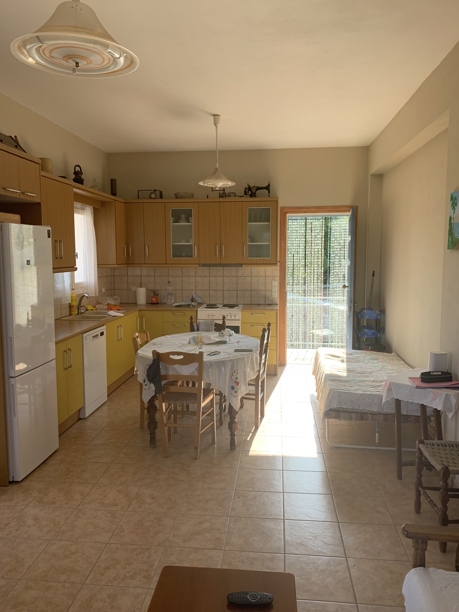 Kitchen and dining area of house for sale in Ithaca Greece, Stavros