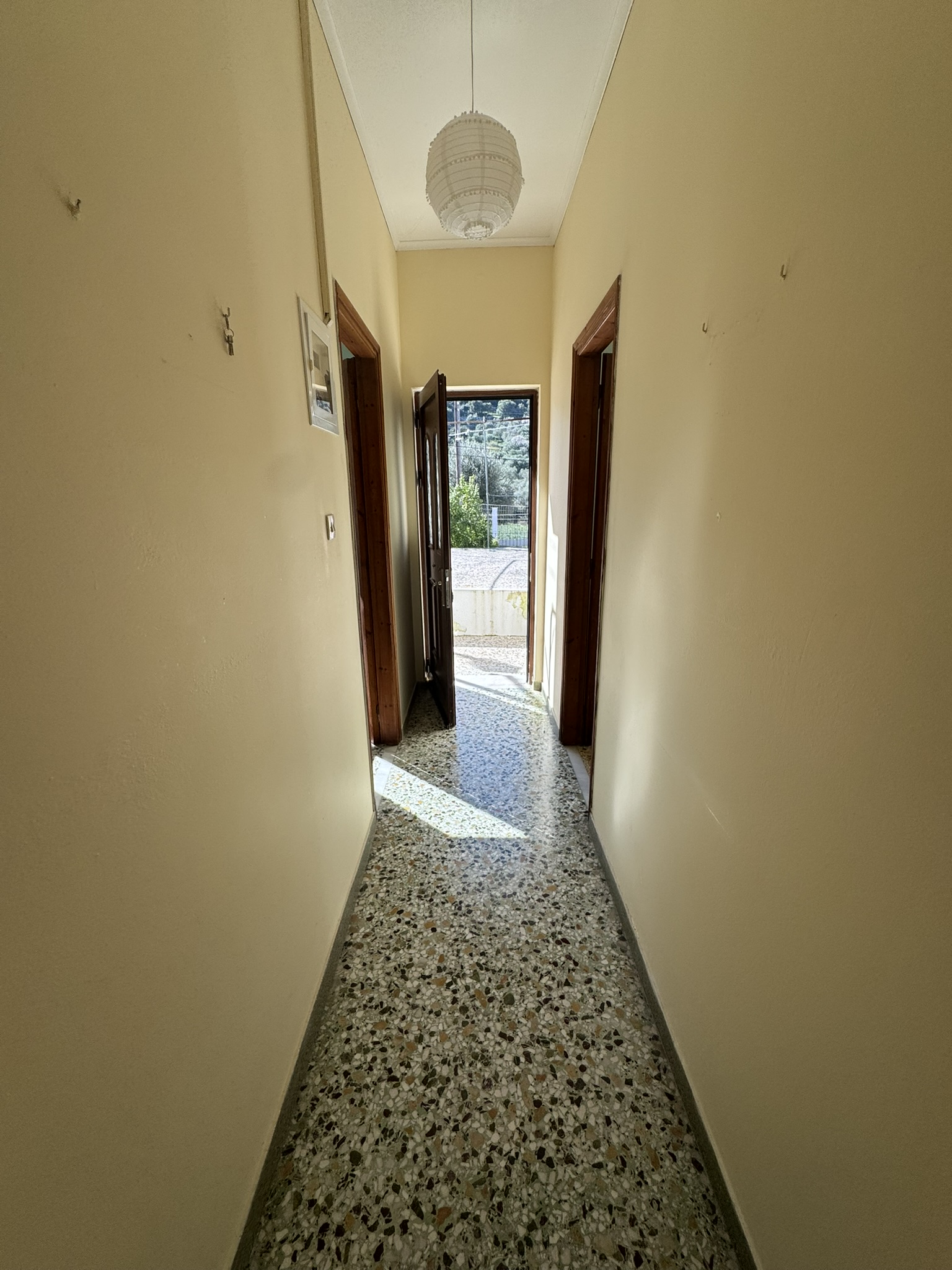 Front door and passage way of house for sale in Ithaca Greece, Vathi