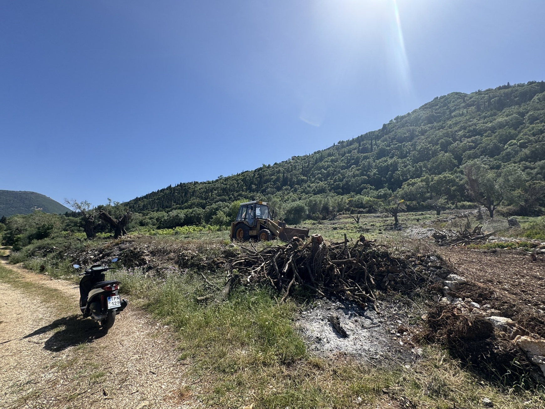 Road view of land for sale in Ithaca Greece, Kolleri