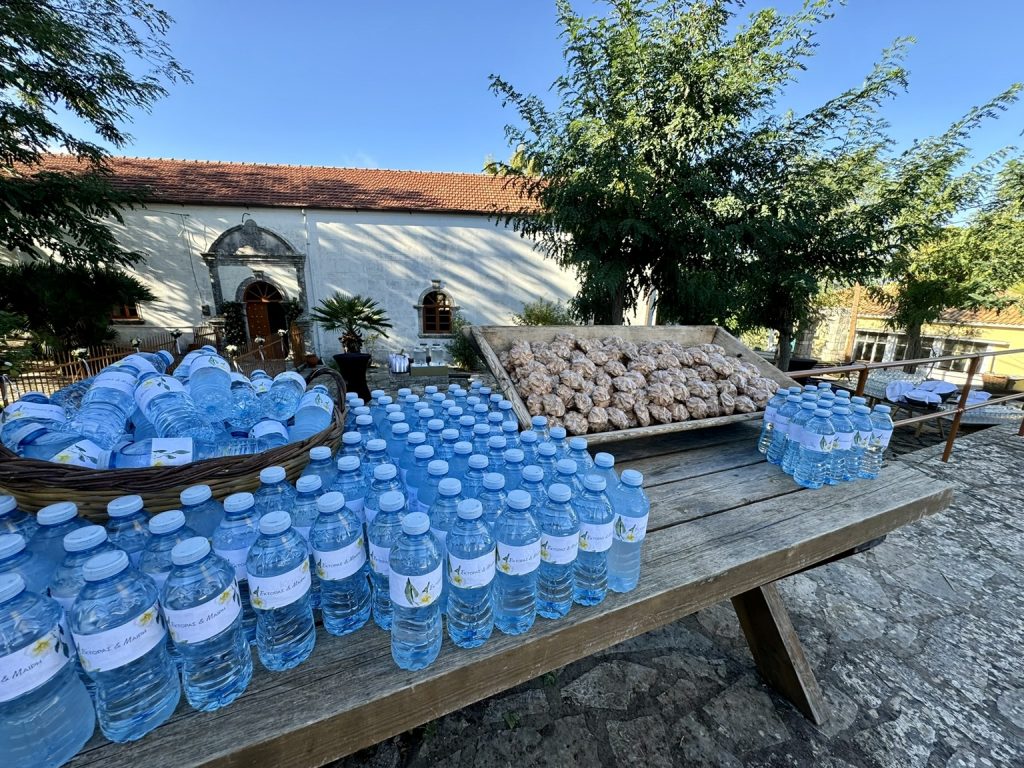 Water bottles and traditional sweets at wedding reception in Ithaca Greece, Anoghi
