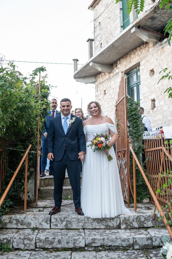 Couple arriving at church for wedding in Ithaca Greece, Anoghi