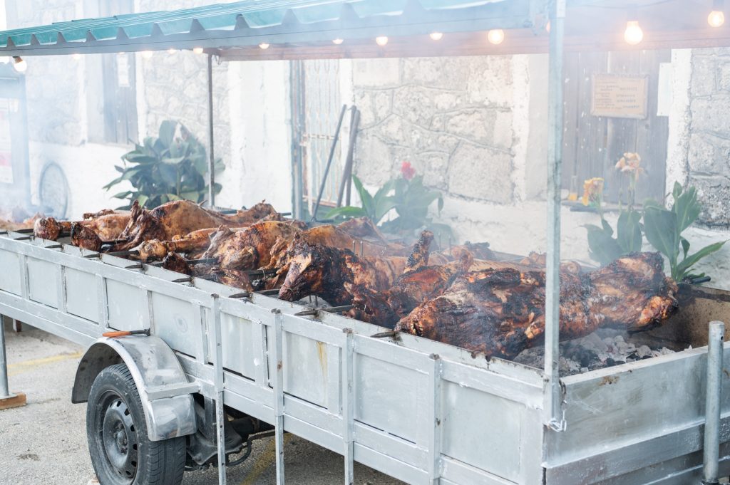 Meat on the spit at wedding reception in Ithaca Greece, Anoghi