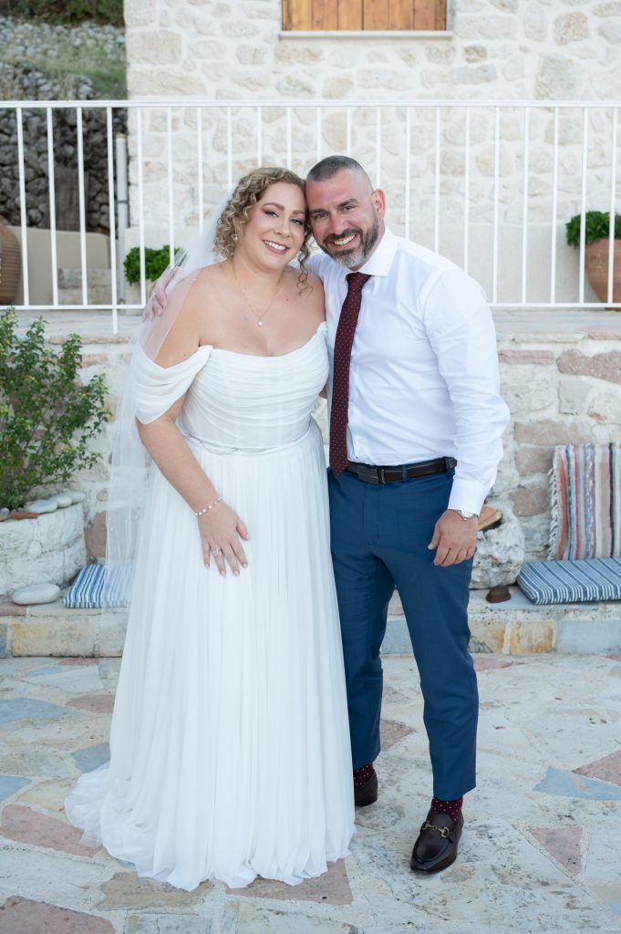 Bride with family at wedding reception in Ithaca Greece Anoghi