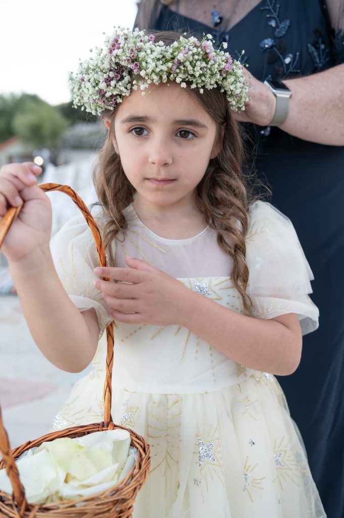Bridesmaid at wedding ceremony in Ithaca Greece, Anoghi