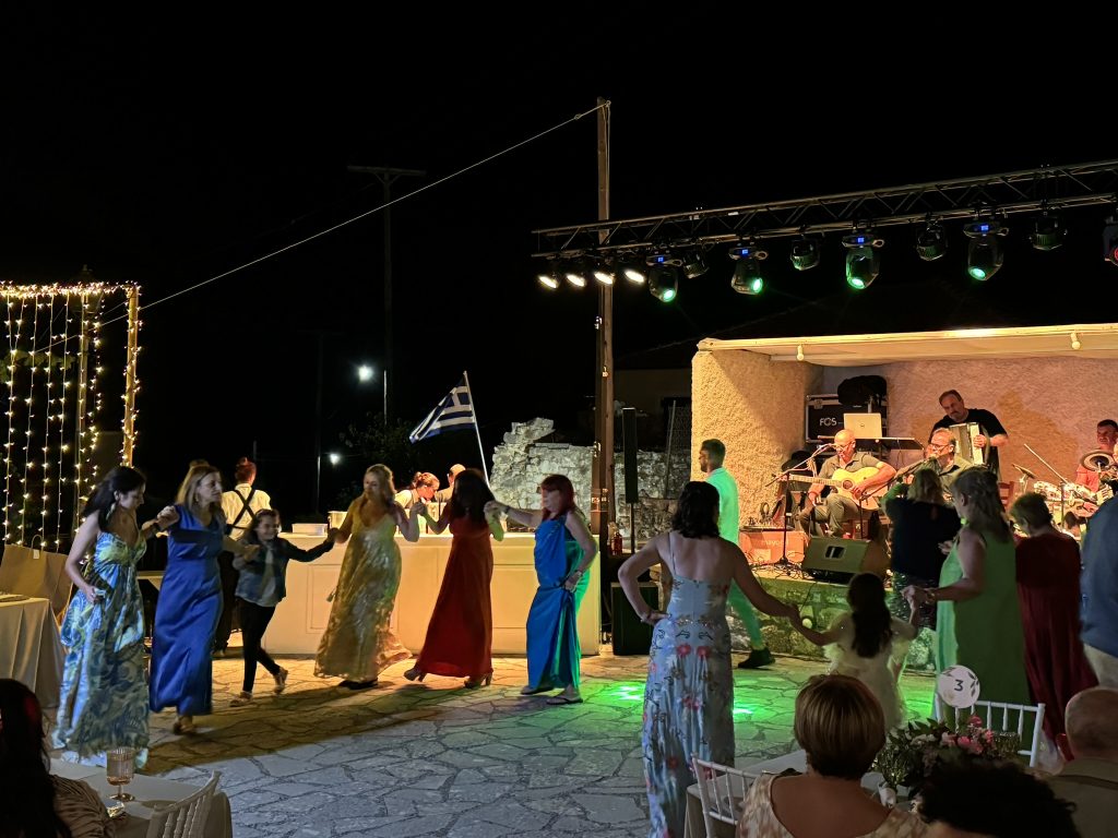 Traditional Greek dances at wedding reception in Ithaca Greece, Anoghi