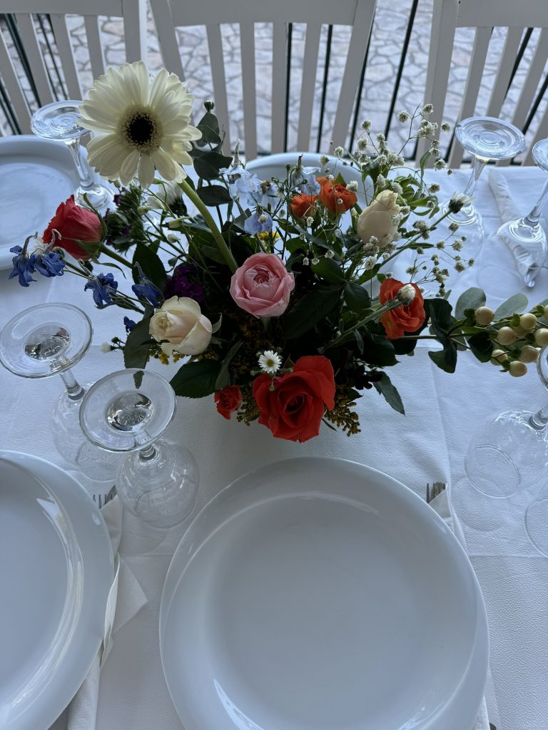 Table setting at wedding rehearsal dinner in Ithaca Greece, Anoghi