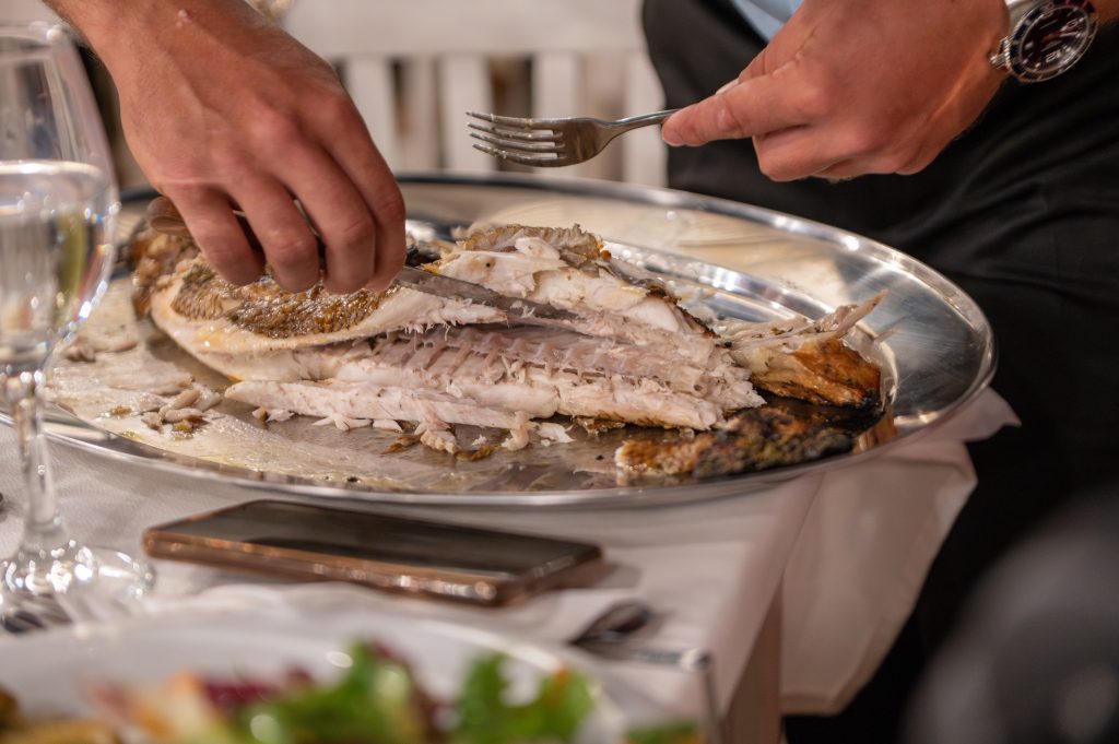 Fish menu at wedding rehearsal dinner in Ithaca Greece, Anoghi