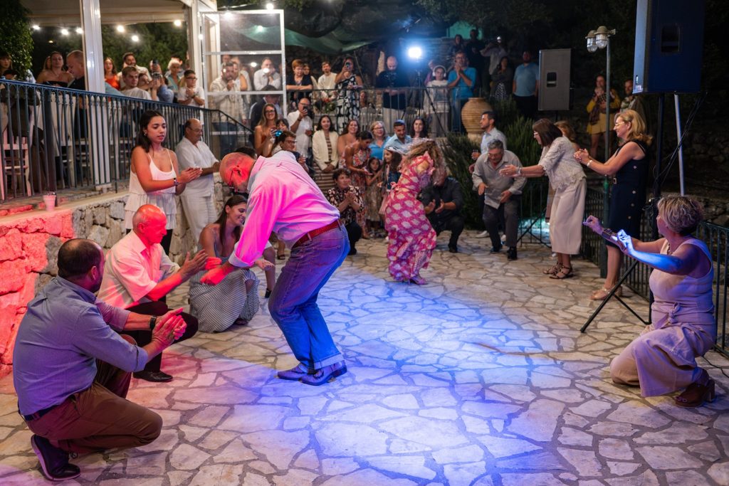 Traditional Greek dances at wedding rehearsal dinner in Ithaca Greece, Anoghi