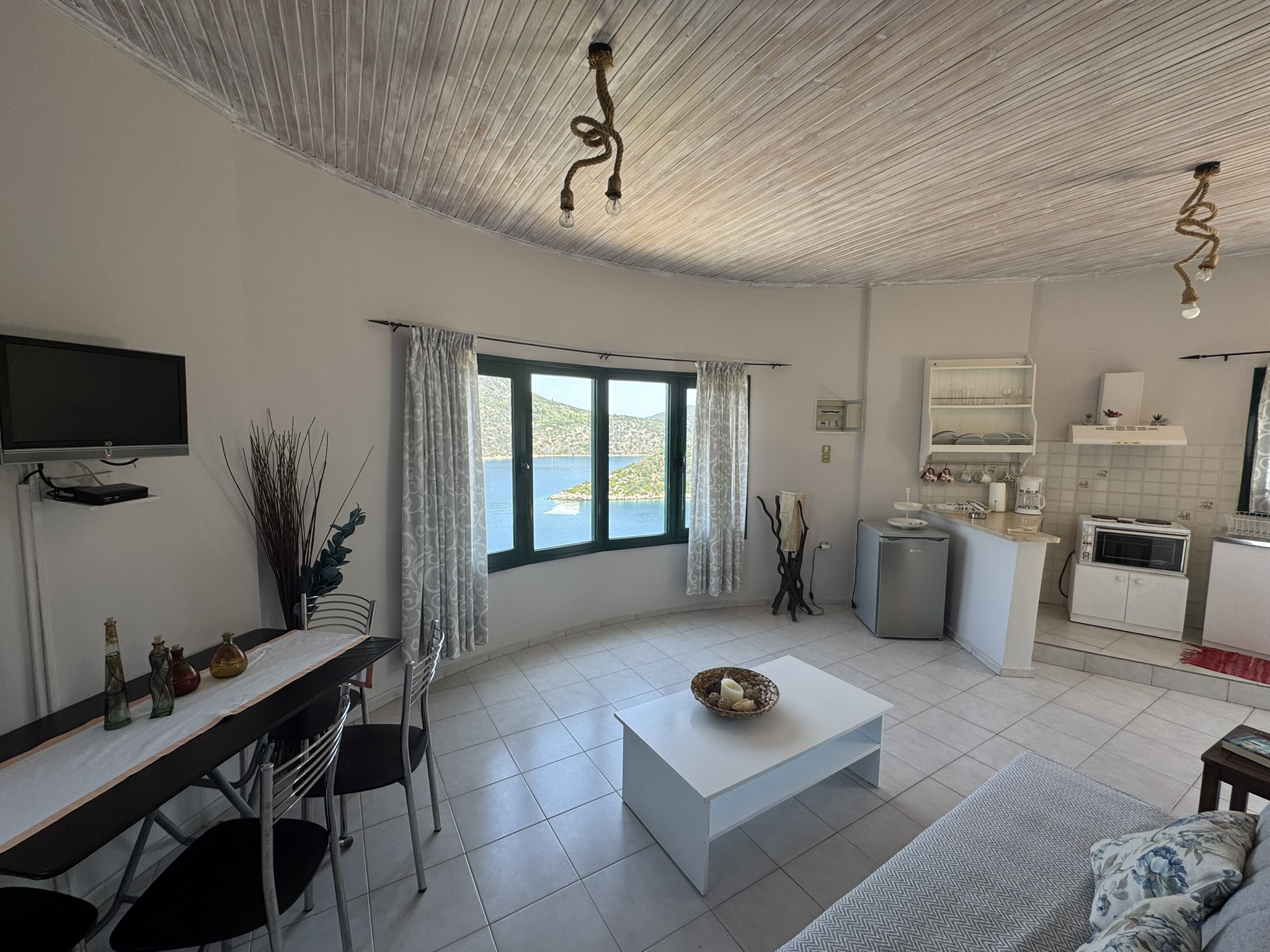 Top floor kitchen and dining area of house for sale in Ithaca Greece, Vathi