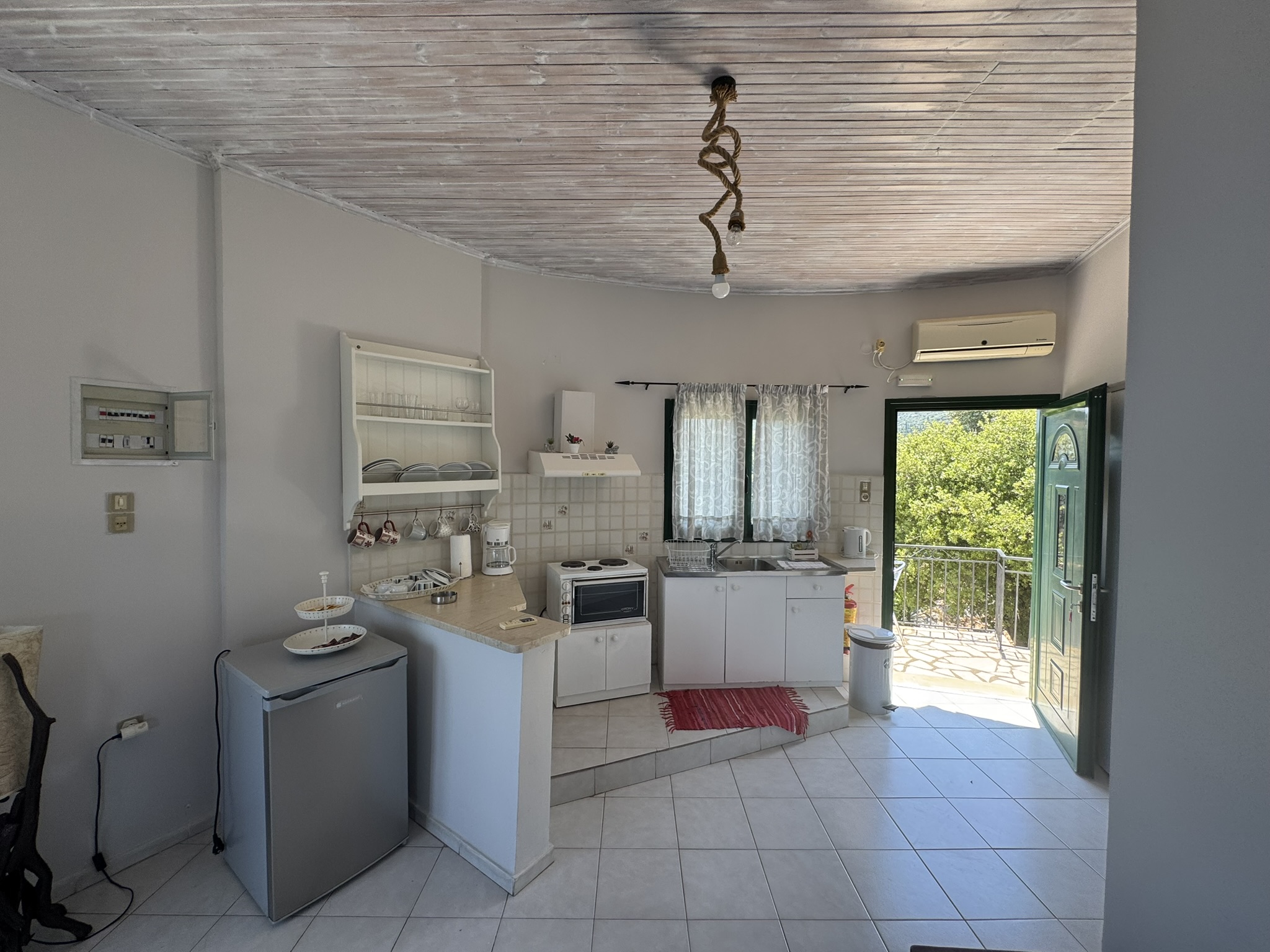 Top floor open plan kitchen area of house for sale in Ithaca Greece, Vathi