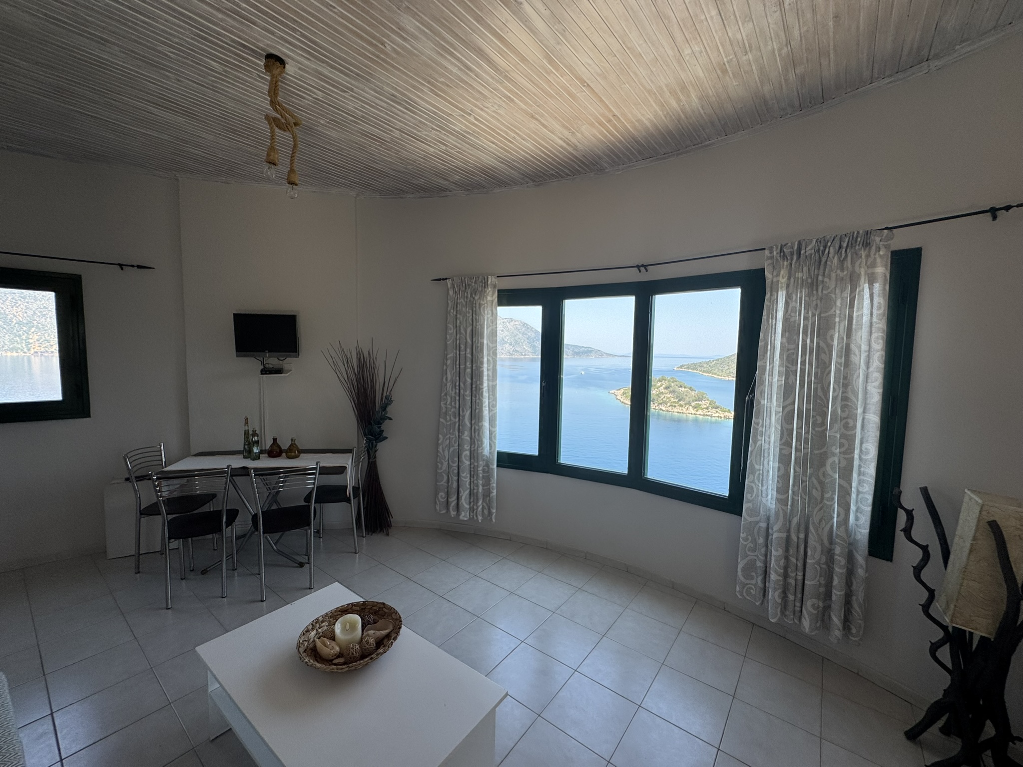 Living room area of top floor in house for sale in Ithaca Greece, Vathi