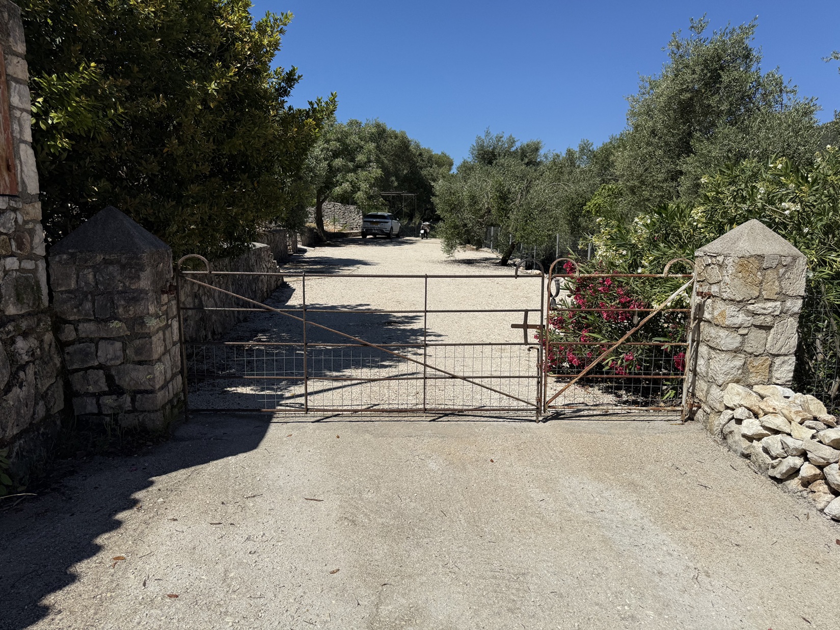 Front gate of house for sale in Ithaca Greece, Stavros