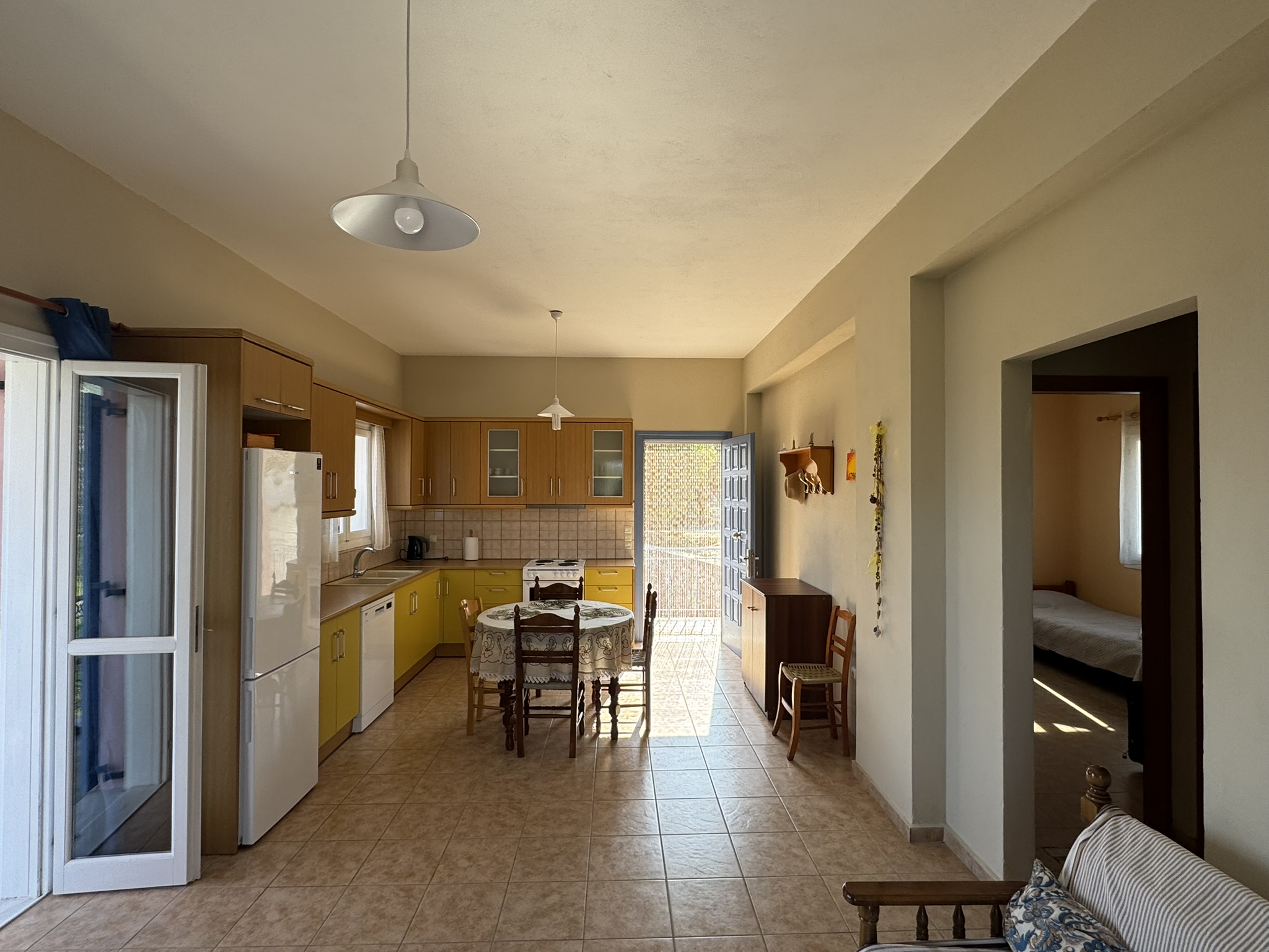 Open plan kitchen and living area of house for sale in Ithaca Greece, Stavros