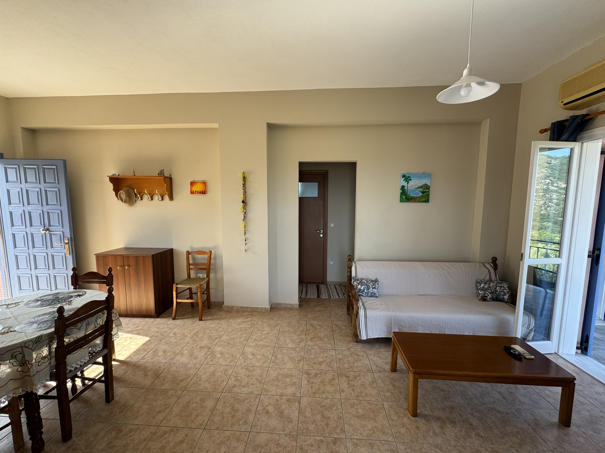 Dining and living area of house for sale in Ithaca Greece, Stavros