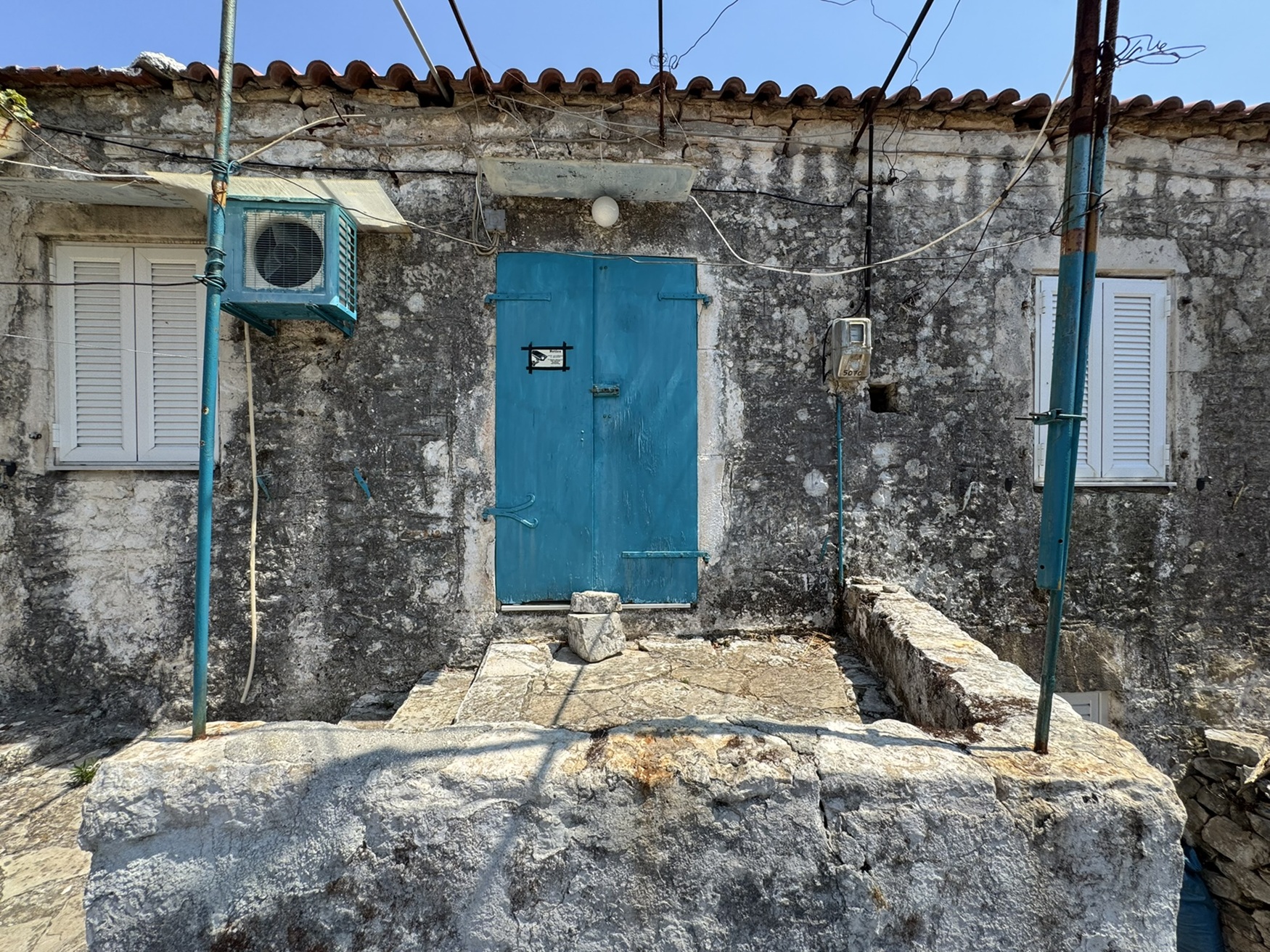 Front door of house for sale in Ithaca Greece, Vathi