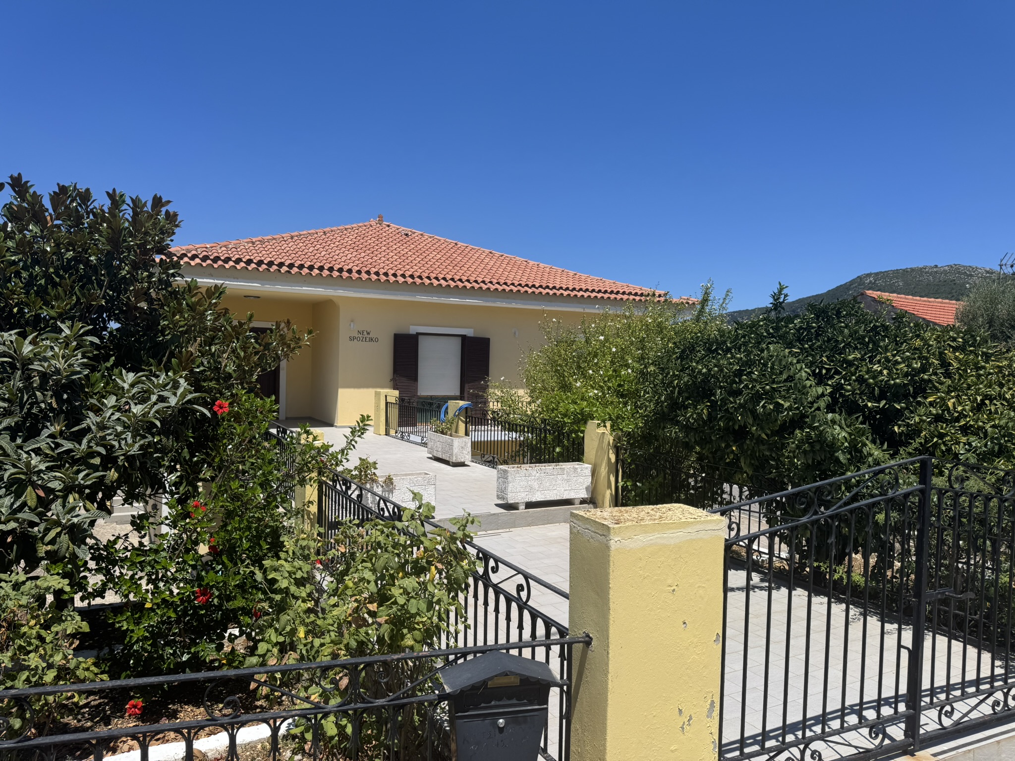 Road view of house for sale in Ithaca Greece, Ag. Saranda