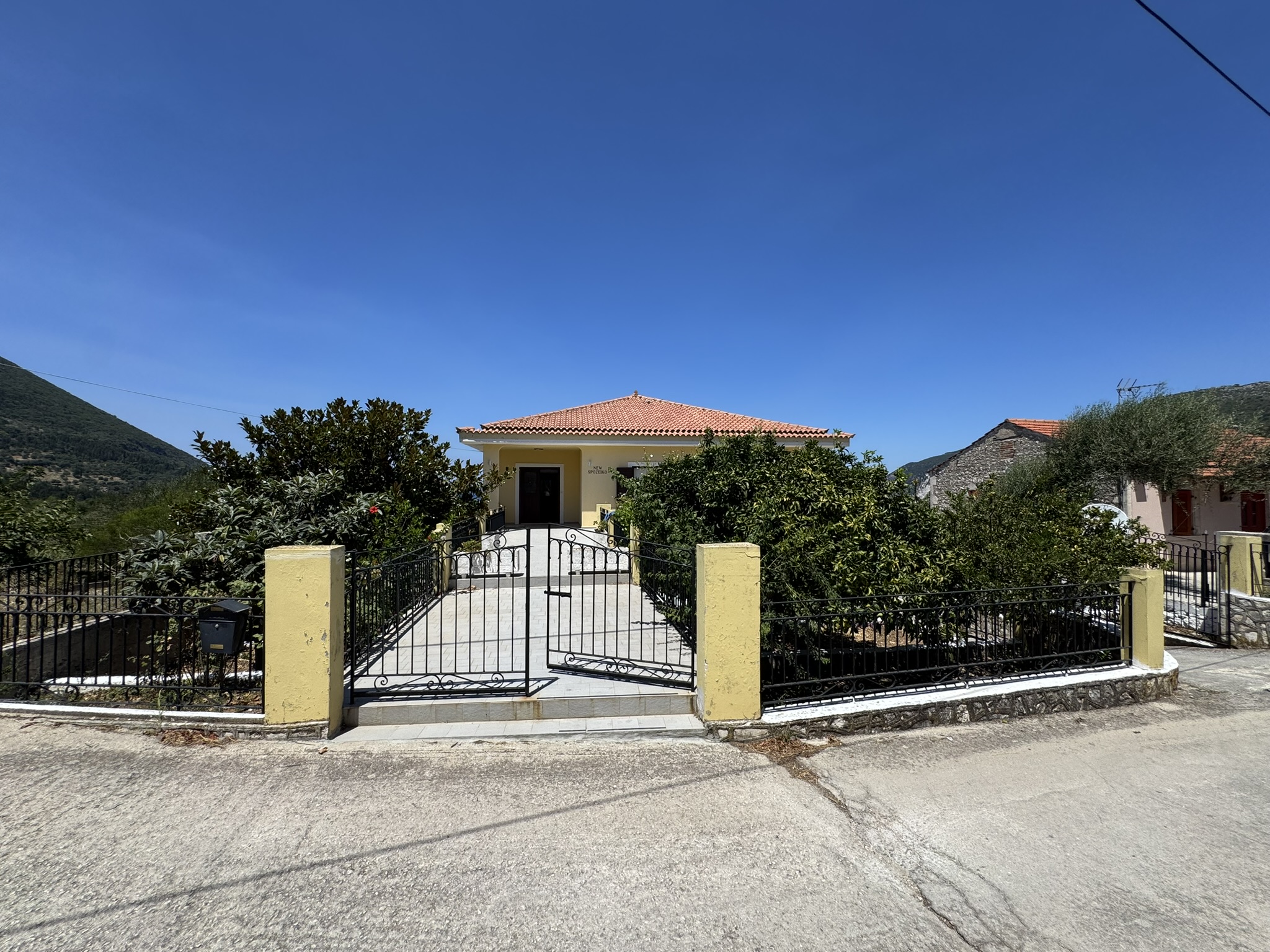 Road view of house for sale in Ithaca Greece, Ag. Saranda