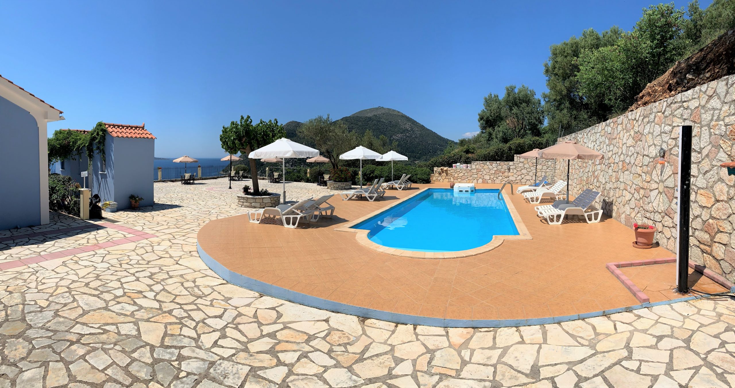 Panoramic view of pool area of cottages for sale in Ithaca Greece, Stavros