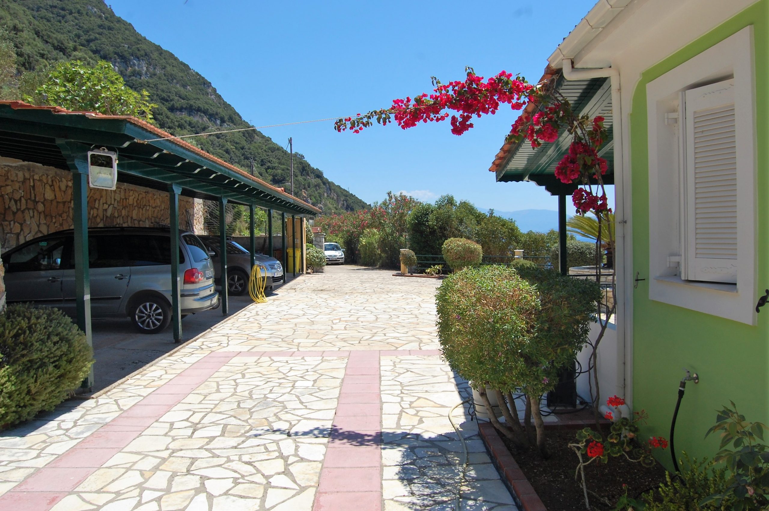 Covered parking of cottages for sale in Ithaca Greece, Stavros