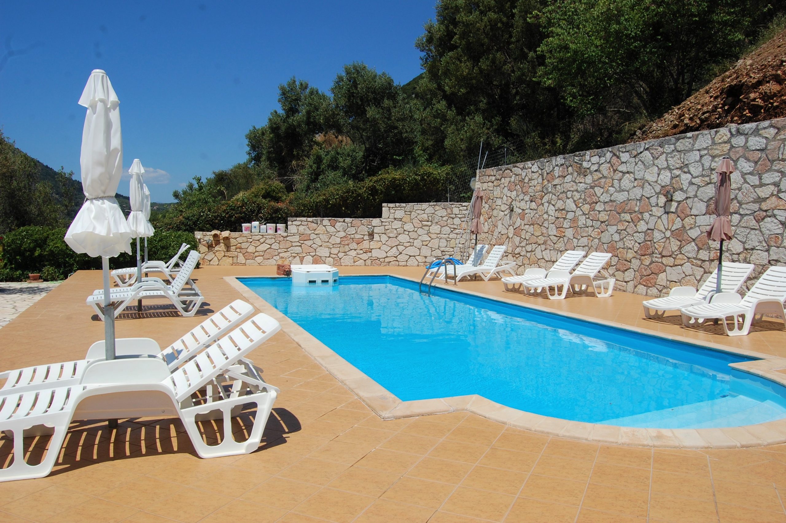 Pool area of cottages for sale in Ithaca Greece, Stavros